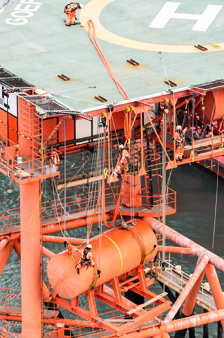 Below-deck lifting of container